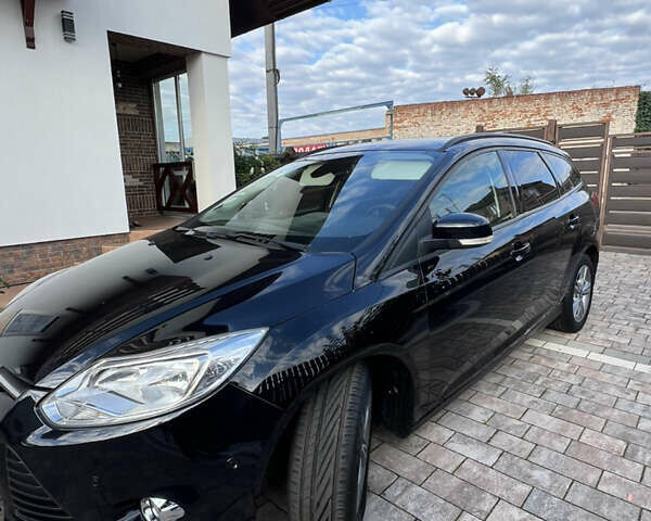 Чорний Форд Фокус, об'ємом двигуна 1.6 л та пробігом 214 тис. км за 8900 $, фото 1 на Automoto.ua