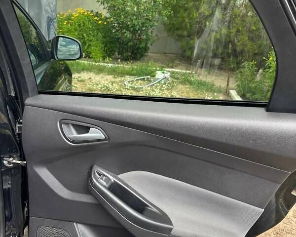 Чорний Форд Фокус, об'ємом двигуна 1.56 л та пробігом 315 тис. км за 6999 $, фото 6 на Automoto.ua