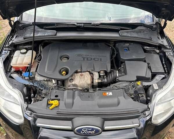 Чорний Форд Фокус, об'ємом двигуна 1.56 л та пробігом 315 тис. км за 6999 $, фото 4 на Automoto.ua