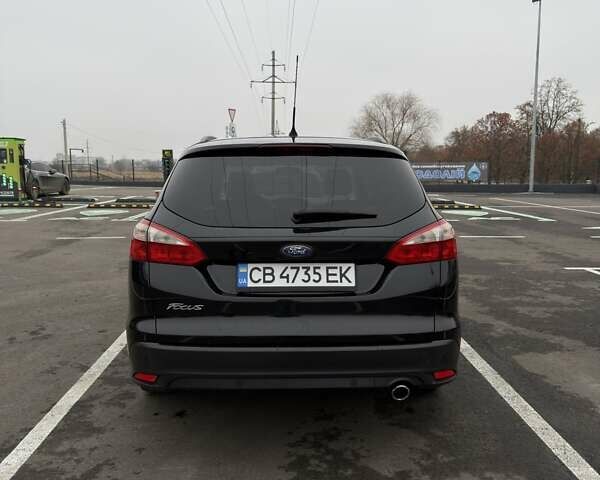 Черный Форд Фокус, объемом двигателя 2 л и пробегом 215 тыс. км за 7700 $, фото 4 на Automoto.ua