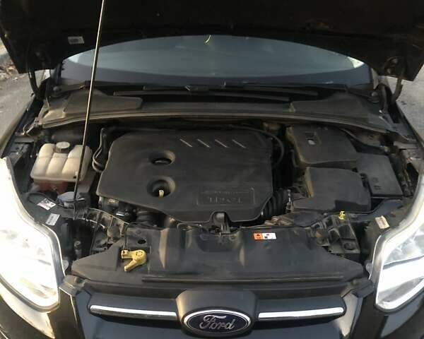 Черный Форд Фокус, объемом двигателя 1.6 л и пробегом 330 тыс. км за 7700 $, фото 23 на Automoto.ua