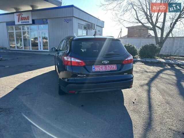 Чорний Форд Фокус, об'ємом двигуна 1.59 л та пробігом 229 тис. км за 8750 $, фото 9 на Automoto.ua