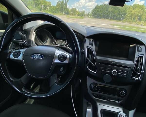 Черный Форд Фокус, объемом двигателя 1.6 л и пробегом 328 тыс. км за 6700 $, фото 7 на Automoto.ua