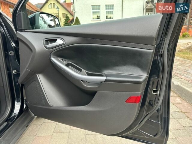 Чорний Форд Фокус, об'ємом двигуна 1.6 л та пробігом 215 тис. км за 8999 $, фото 71 на Automoto.ua