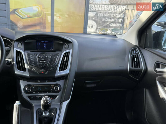 Форд Фокус 2013 у Стрые на Automoto.ua Чорний Форд Фокус, об'ємом двигуна 1.6 л та пробігом 240 тис. км за 8999 $, фото 37 на Automoto.ua