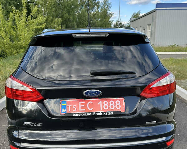 Черный Форд Фокус, объемом двигателя 1 л и пробегом 190 тыс. км за 7100 $, фото 10 на Automoto.ua