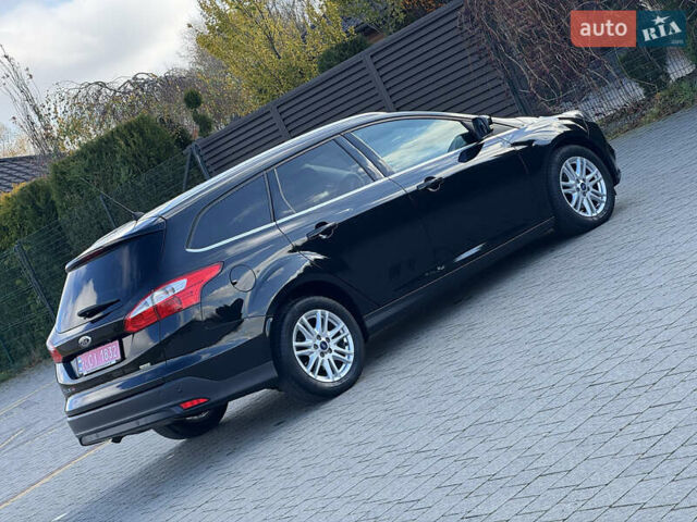 Чорний Форд Фокус, об'ємом двигуна 1.6 л та пробігом 278 тис. км за 8599 $, фото 75 на Automoto.ua