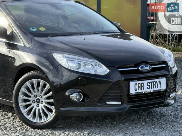 Форд Фокус 2013 у Стрые на Automoto.ua Чорний Форд Фокус, об'ємом двигуна 1.6 л та пробігом 240 тис. км за 8999 $, фото 6 на Automoto.ua