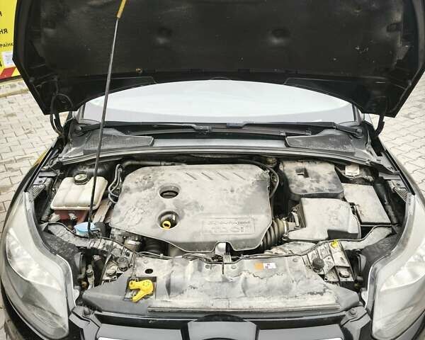 Черный Форд Фокус, объемом двигателя 1.6 л и пробегом 325 тыс. км за 7000 $, фото 24 на Automoto.ua