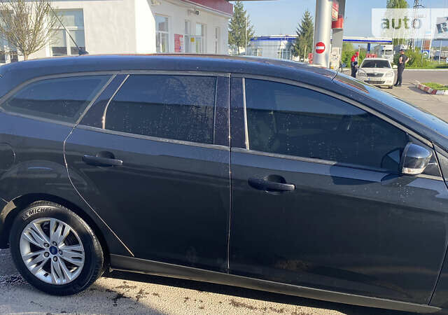 Черный Форд Фокус, объемом двигателя 1.6 л и пробегом 295 тыс. км за 6800 $, фото 6 на Automoto.ua