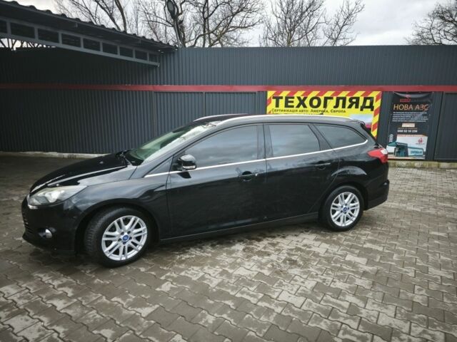 Черный Форд Фокус, объемом двигателя 1.6 л и пробегом 325 тыс. км за 7000 $, фото 2 на Automoto.ua