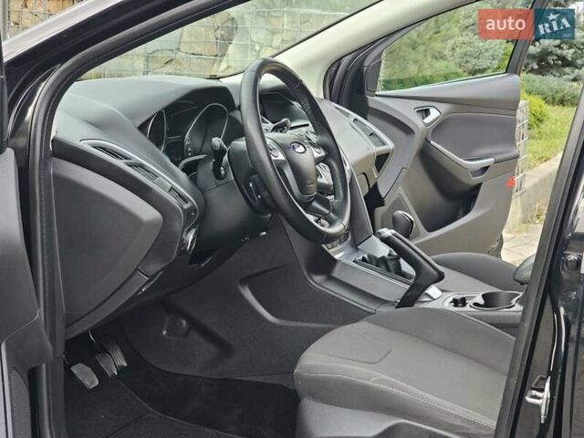 Черный Форд Фокус, объемом двигателя 1.6 л и пробегом 231 тыс. км за 8999 $, фото 77 на Automoto.ua