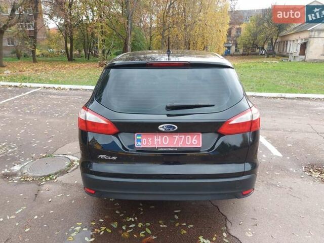 Черный Форд Фокус, объемом двигателя 1.6 л и пробегом 170 тыс. км за 7300 $, фото 4 на Automoto.ua