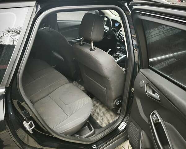 Черный Форд Фокус, объемом двигателя 1.6 л и пробегом 325 тыс. км за 7000 $, фото 21 на Automoto.ua