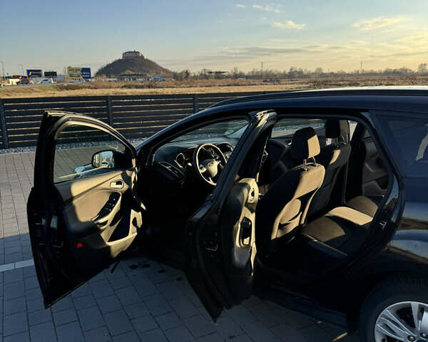 Черный Форд Фокус, объемом двигателя 1 л и пробегом 160 тыс. км за 7200 $, фото 12 на Automoto.ua