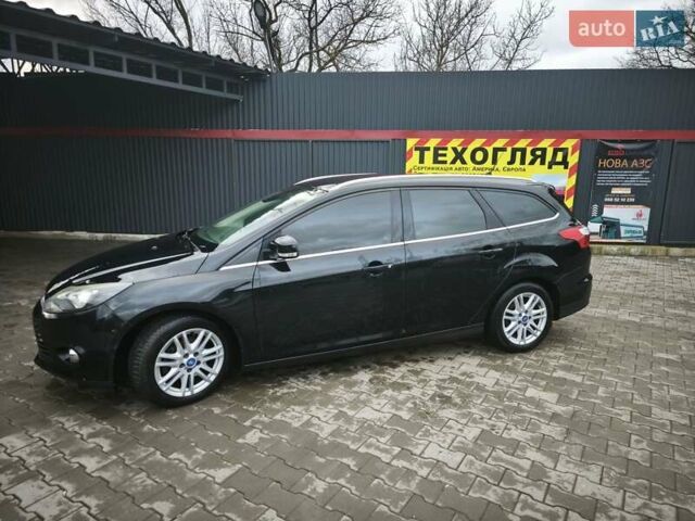 Черный Форд Фокус, объемом двигателя 1.6 л и пробегом 325 тыс. км за 7000 $, фото 2 на Automoto.ua