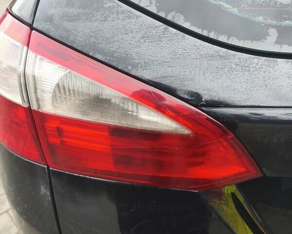 Черный Форд Фокус, объемом двигателя 1.6 л и пробегом 325 тыс. км за 7000 $, фото 4 на Automoto.ua