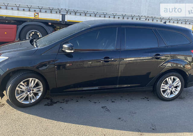 Черный Форд Фокус, объемом двигателя 1.6 л и пробегом 295 тыс. км за 6800 $, фото 7 на Automoto.ua