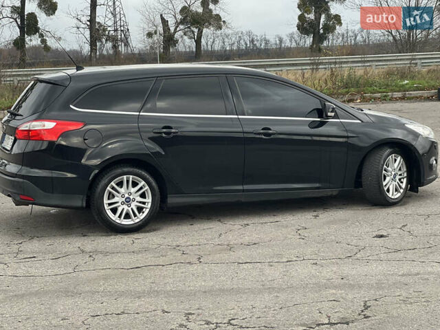 Черный Форд Фокус, объемом двигателя 2 л и пробегом 265 тыс. км за 8999 $, фото 1 на Automoto.ua