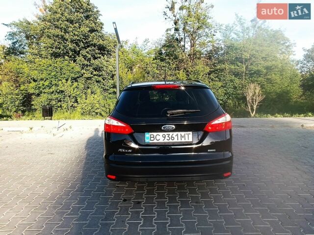 Чорний Форд Фокус, об'ємом двигуна 1 л та пробігом 156 тис. км за 6800 $, фото 15 на Automoto.ua