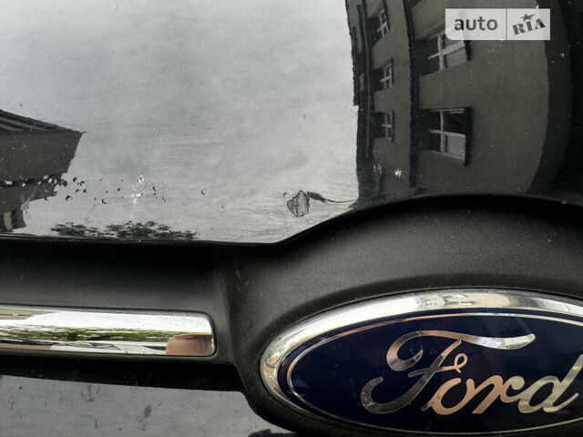 Черный Форд Фокус, объемом двигателя 1.56 л и пробегом 203 тыс. км за 8300 $, фото 12 на Automoto.ua
