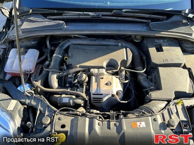 Черный Форд Фокус, объемом двигателя 1 л и пробегом 252 тыс. км за 6400 $, фото 2 на Automoto.ua