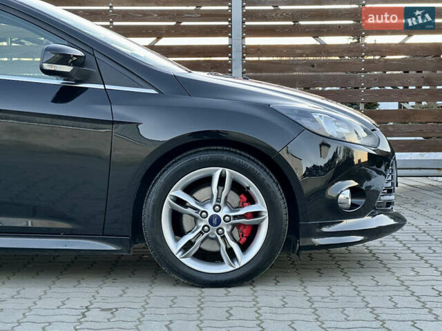 Чорний Форд Фокус, об'ємом двигуна 1.6 л та пробігом 195 тис. км за 8999 $, фото 35 на Automoto.ua