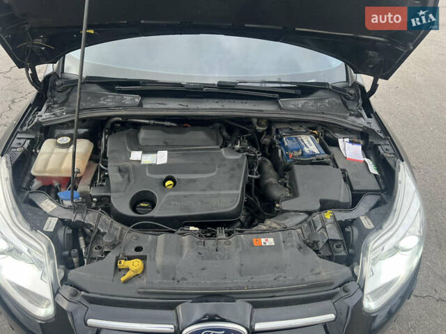 Черный Форд Фокус, объемом двигателя 2 л и пробегом 265 тыс. км за 8999 $, фото 21 на Automoto.ua