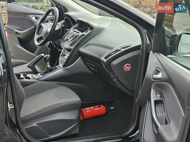 Черный Форд Фокус, объемом двигателя 1.6 л и пробегом 231 тыс. км за 8999 $, фото 70 на Automoto.ua