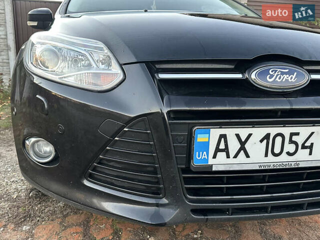 Черный Форд Фокус, объемом двигателя 2 л и пробегом 260 тыс. км за 7800 $, фото 58 на Automoto.ua