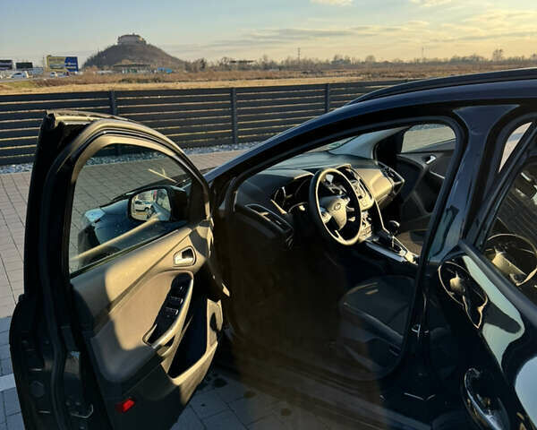 Черный Форд Фокус, объемом двигателя 1 л и пробегом 160 тыс. км за 7200 $, фото 3 на Automoto.ua