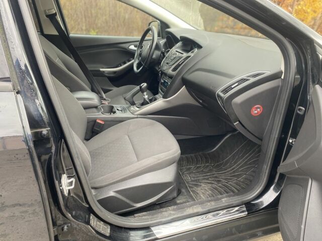 Черный Форд Фокус, объемом двигателя 1.6 л и пробегом 231 тыс. км за 8300 $, фото 14 на Automoto.ua