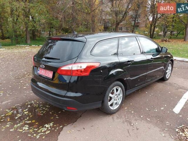 Черный Форд Фокус, объемом двигателя 1.6 л и пробегом 170 тыс. км за 7300 $, фото 3 на Automoto.ua