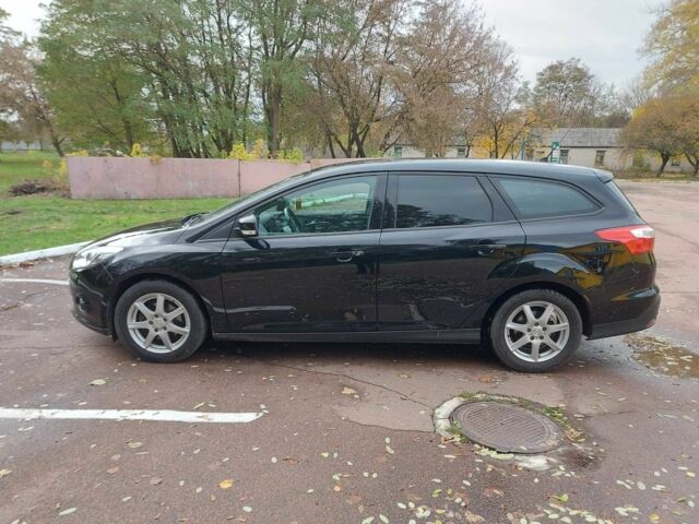 Черный Форд Фокус, объемом двигателя 1.6 л и пробегом 170 тыс. км за 7300 $, фото 7 на Automoto.ua