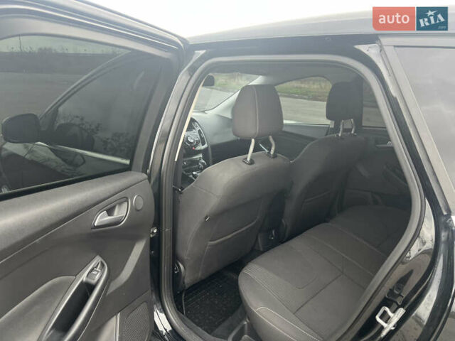 Черный Форд Фокус, объемом двигателя 2 л и пробегом 265 тыс. км за 8999 $, фото 15 на Automoto.ua