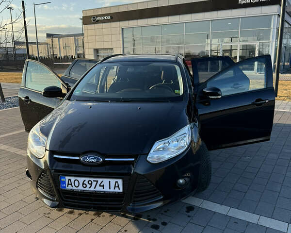 Черный Форд Фокус, объемом двигателя 1 л и пробегом 160 тыс. км за 7200 $, фото 4 на Automoto.ua