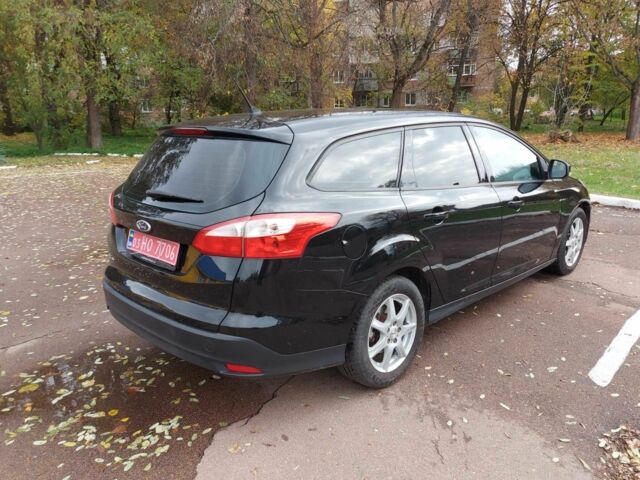 Черный Форд Фокус, объемом двигателя 1.6 л и пробегом 170 тыс. км за 7300 $, фото 4 на Automoto.ua