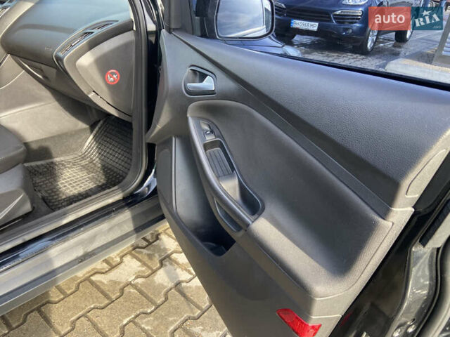 Чорний Форд Фокус, об'ємом двигуна 1 л та пробігом 190 тис. км за 7300 $, фото 15 на Automoto.ua