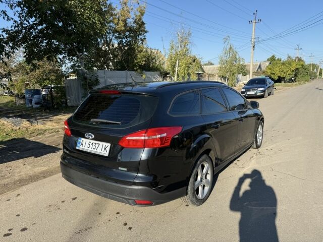 Черный Форд Фокус, объемом двигателя 1 л и пробегом 150 тыс. км за 4350 $, фото 2 на Automoto.ua
