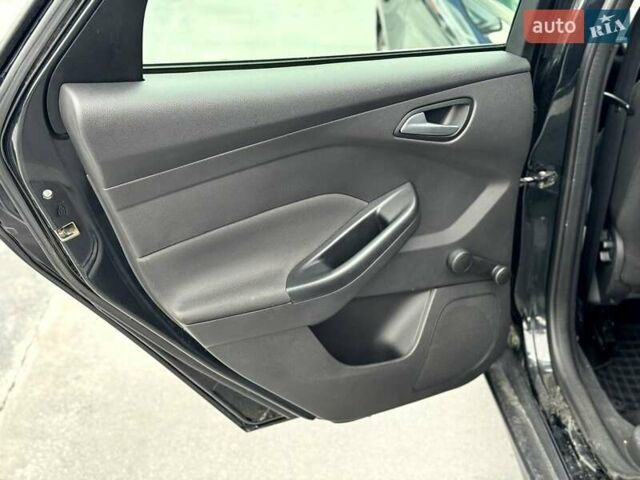 Черный Форд Фокус, объемом двигателя 1.56 л и пробегом 250 тыс. км за 8700 $, фото 29 на Automoto.ua