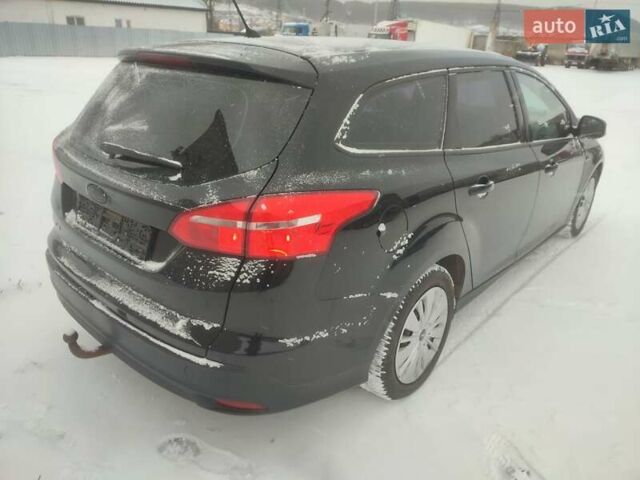 Черный Форд Фокус, объемом двигателя 1.6 л и пробегом 227 тыс. км за 6450 $, фото 5 на Automoto.ua