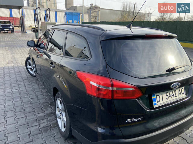 Чорний Форд Фокус, об'ємом двигуна 1 л та пробігом 190 тис. км за 7300 $, фото 4 на Automoto.ua