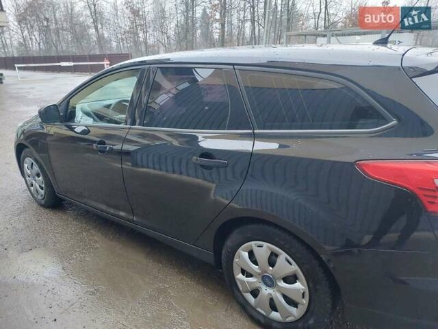 Чорний Форд Фокус, об'ємом двигуна 1.56 л та пробігом 259 тис. км за 8400 $, фото 5 на Automoto.ua