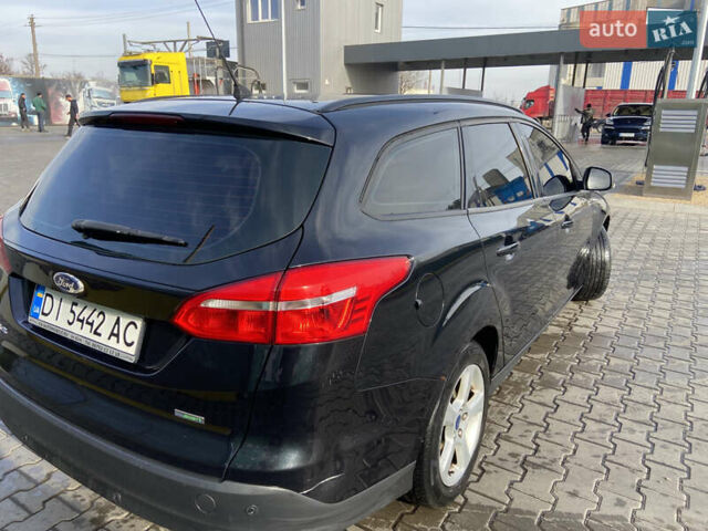 Чорний Форд Фокус, об'ємом двигуна 1 л та пробігом 190 тис. км за 7300 $, фото 3 на Automoto.ua
