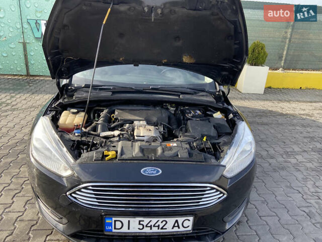 Чорний Форд Фокус, об'ємом двигуна 1 л та пробігом 190 тис. км за 7300 $, фото 9 на Automoto.ua