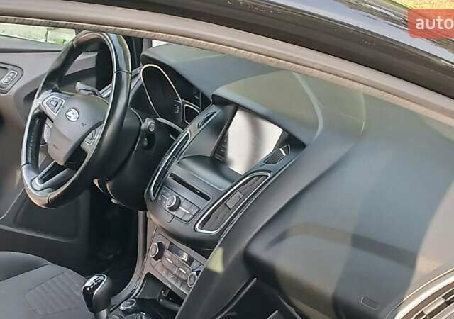 Черный Форд Фокус, объемом двигателя 1.6 л и пробегом 148 тыс. км за 9800 $, фото 34 на Automoto.ua