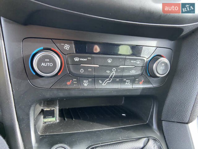 Чорний Форд Фокус, об'ємом двигуна 1 л та пробігом 190 тис. км за 7300 $, фото 19 на Automoto.ua