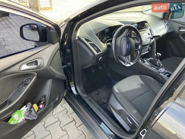 Чорний Форд Фокус, об'ємом двигуна 1 л та пробігом 190 тис. км за 7300 $, фото 7 на Automoto.ua