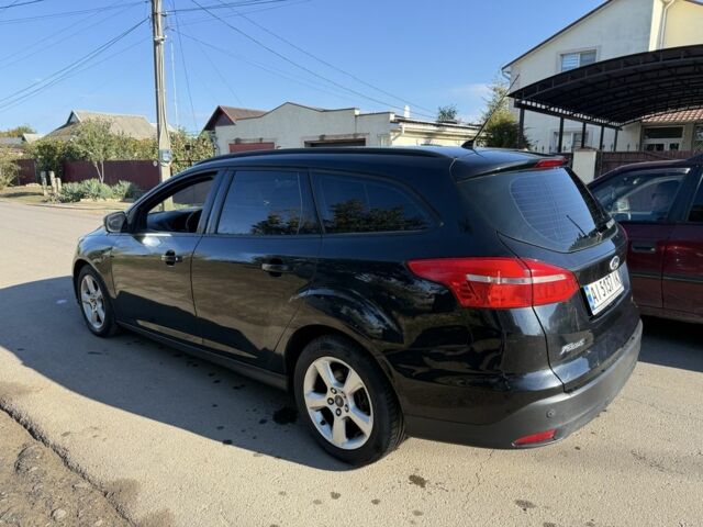 Черный Форд Фокус, объемом двигателя 1 л и пробегом 150 тыс. км за 4350 $, фото 5 на Automoto.ua