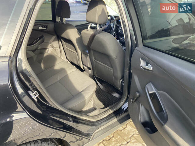 Чорний Форд Фокус, об'ємом двигуна 1 л та пробігом 190 тис. км за 7300 $, фото 12 на Automoto.ua